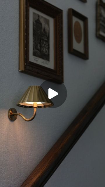 996K views · 46K likes | Nida Rehman | DIY & CREATE on Instagram: "I got two of the cutest lamp sconces from @solariko.designs one for the top of the stairs and one for the bottom. They’re exactly what my gallery wall needed! I love that they’re rechargeable and so easy to install. Check them out on my LTK page under my bio!   #rechargablesconces #vintagesconces #lamp #lampdesign #sconce #gold #nothardwired #nofilter #lighting #gallery #gallerywall #homedecor #homesweethome #house #stairs #staircase" Sconces In Stairwell, Picture Wall Ideas With Scones, Rechargeable Wall Light, Gallery Wall Lights, Gallery Wall With Lights, Wall At Top Of Stairs, Top Of The Stairs Decor, Bottom Of Stairs Decor, Stairs Lamp