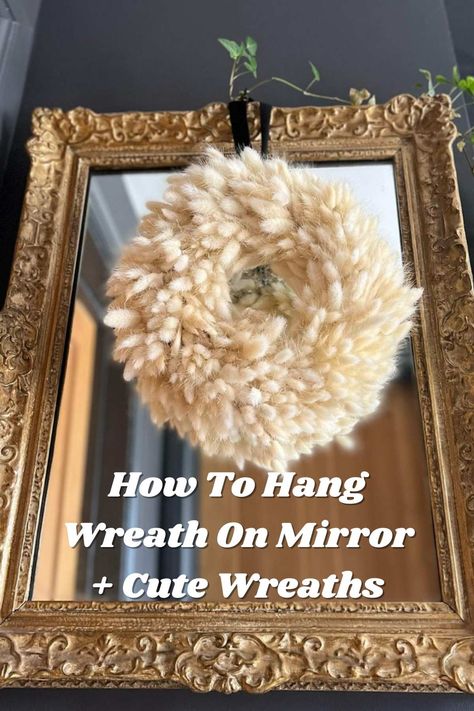 How To Hang Wreath On Mirror + Cute Examples - Pink Pop Design Mirrors With Wreaths, Wreaths On Mirrors Christmas, Wreath On Headboard, Mirror Wreath Decor, How To Hang Wreath On Mirror, Wreath On Mirror Christmas, Wreath On Mirror Ideas, How To Decorate A Mirror For Christmas, Christmas Wreath On Mirror