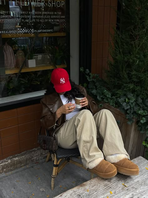 Red yankee hat, fall outfit, pop of red, styling uggs, ugg slippers, red hat outfit, brown and red outfit, ugg outfit Nyc Yankees Hat Outfit, Nyc Yankees Hat, Ny Beanie Outfit, Nyc Baseball Cap Outfit, Red Hat Outfit Summer, Brown Yankees Hat Outfit, Red New York Yankees Hat Outfit, Red Ny Cap Outfit, Mlb Hats Outfit