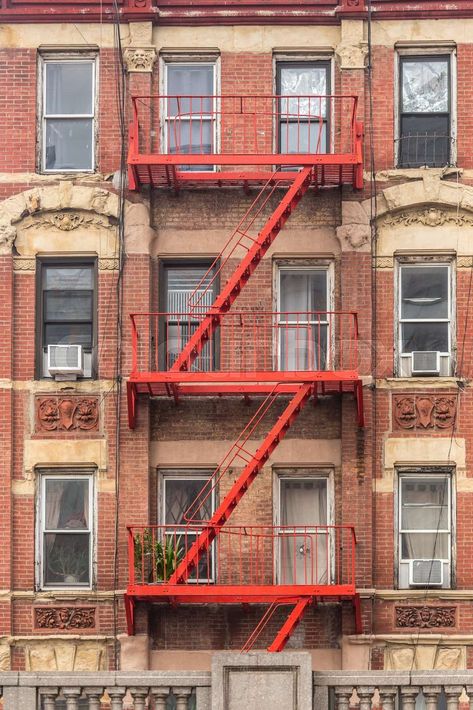 Red fire escape of an apartment building in New York city Apartment Fire Escape, Escape Tattoo, Nyc Fire Escape, Read Me When, New York City Images, City Editorial, Winter Town, New York Buildings, Background References