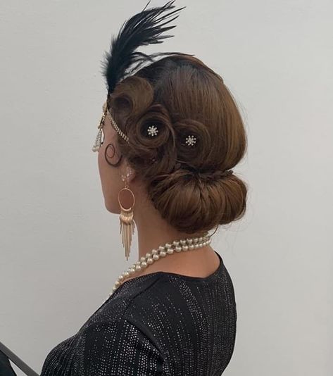 Hairstyles 1920s Gatsby, 1920s Bun Hairstyle, Flapper Updo Long Hair, 1920s Side Bun, How To 1920s Hairstyles For Long Hair, 1920s Hairstyles For Long Hair Updo, 20s Updos For Long Hair, 20s Hairstyles Long Hair, 1920s Hair Updo Gatsby