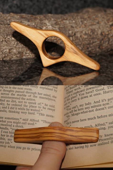 Read while comfortably holding a book open with one hand with a thumb ring book holder. Book Finger Holder, Wooden Thumb Book Holder, Open Book Holder, Thumb Book Holder Diy, Book Ring Holder, Wooden Page Holder Pattern, Woodworking Gifts For Her, Book Thumb Holder, Book Holder Ideas