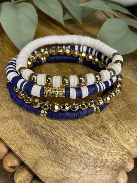 Navy Clay Bead Bracelet, Navy Beaded Bracelets, Dark Bracelet Ideas, Bead Bracelet Ideas Color Combinations, Clay Bead Bracelet Stack Ideas, Clay Bead Bracelet Ideas Sports, Navy Blue Bracelet, Blue Bracelet Stack, Diy Bracelets Beads