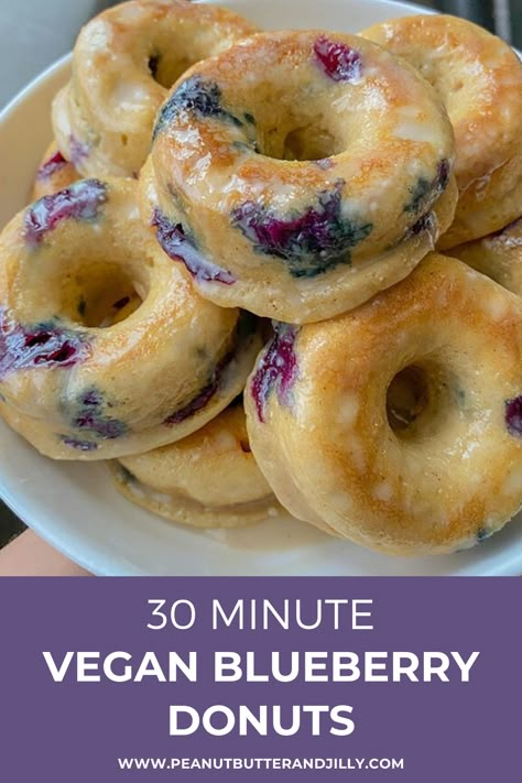 These vegan blueberry donuts are quick and easy to make! They are fluffy, baked not fried, melt in your mouth, and only take 30 minutes! Donut Tray, Blueberry Donuts, Vegan Baking Recipes, Vegan Donuts, Vegan Baked, Donut Recipe, Vegan Brunch, Powder Sugar, Vegan Blueberry