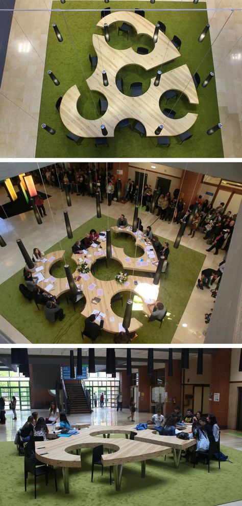 Menéndez and Gamonal Arquitectos have designed large meeting/gathering table inspired by an artists palette, for the Classroom Building in the Milan Campus at Oviedo University in Asturias, Spain. Work Station Office Design, Gathering Area Design, Classroom University Design, Interactive Spaces In Campus, Coworking Table Design, Interactive Table Design, Open Classroom Design, Interactive Classroom Design, Working Area Design