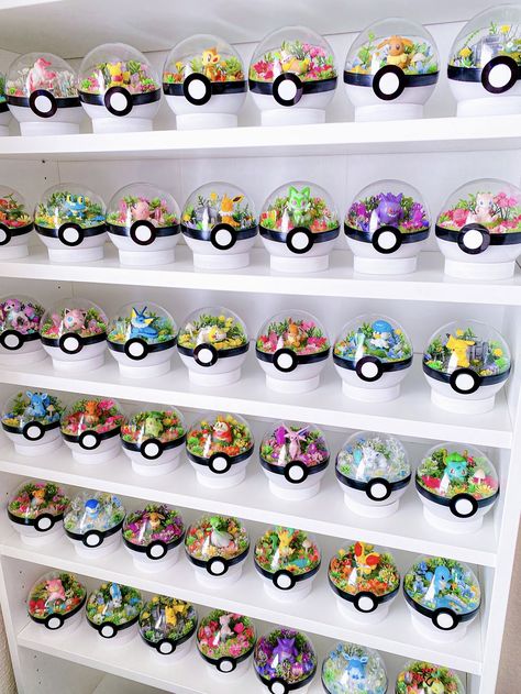 Pokemon Garden Ideas, Pokemon Diy Room Decor, Subtle Pokemon Decor, Pokeball Decoration, Pokemon Figures Display, Pokemon Room Decor Ideas, Pokémon Theme Room, Pokemon Gaming Room, Pokemon Wall Decor