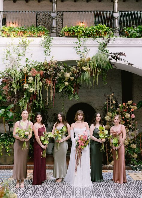 A Chic Whimsical Fairytale Forest Wedding Full of Overgrown Florals Whimsical Garden Wedding Bridesmaid, Purple And Green Bridesmaid Dresses, Green And Purple Bridesmaid Dresses, Plum And Green Wedding, Botanical Wedding Dress, Fairytale Forest Wedding, Romantic Forest Wedding, Aesthetic Shots, Rose Gold Bridesmaid Dress