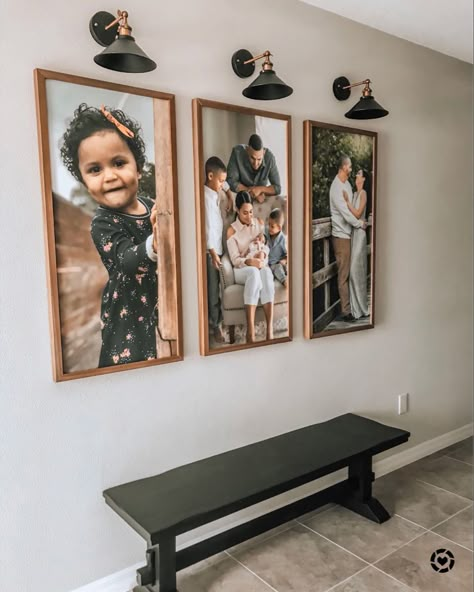 I’ve been wanting to add some sconces over my favorite custom framed prints from @smallwoodhome since I first hung them. These black and gold sconces were exactly what I had in mind and compliment my entry way bench perfectly! I plan on using @nestingwithgrace magic light trick using pucklights. I’ll post again once they’re in but I was so excited it I couldn’t wait to share! http://liketk.it/2RSfL  #liketkit @liketoknow.it Entryway With Family Pictures, Black Picture Wall, Home Photo Wall Ideas, Memories Wall Ideas, Family Photo Entryway, Black And Gold Picture Wall, Photos Home Decor, Family Portraits In Living Room, Hallway Family Photos