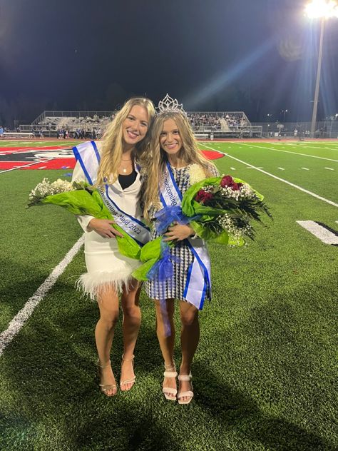 Homecoming queen and maid in homecoming suits holding bouquets at homecoming football game Homecoming Court Aesthetic, Homecoming Queen Aesthetic, Homecoming Court Suits, Homecoming Group Pictures, Cheer Vibes, Hoco Queen, Homecoming Aesthetic, Living So Good, Senior Year Aesthetic