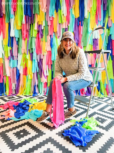 DIY COLORFUL TASSEL FRINGE STREAMER PHOTO BOOTH BACKDROP Diy Colorful Backdrop, Diy Fringe Backdrop, Diy Party Props, Three Esta, Diy Streamers, Dimples And Tangles, Streamer Decorations, Christmas Party Backdrop, Smith Wedding