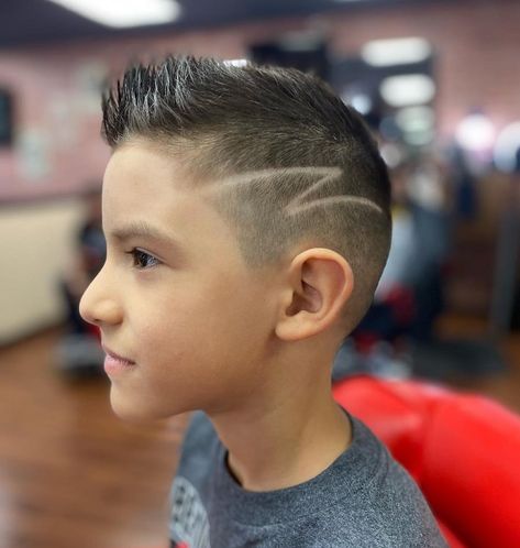 25 Faux Hawk Hairstyles for Boys to Steal The Limelight Boys Faux Hawk, Fohawk Haircut Fade, Fohawk Haircut, Boys Haircuts With Designs, Curly Faux Hawk, Boys Fade Haircut, Hairstyles For Boys, Mohawk Haircut