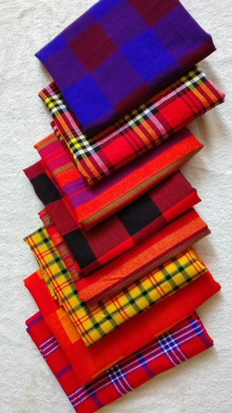 The Shuka Cloth, originating from the Maasai Tribe in Kenya East Africa.   Here at Tuku Fontein we still cherish the original Shuka Maasai Cloth, because it's more than just fabric, it's a nations dignity! It is strong, colorful and very friendly to the skin  #KeDiNonwaneTsaDiTuku Maasai Tribe Clothing, Maasai Dress Designs, African Exhibition, Maasai Dress, African Living Rooms, African Museum, Maasai Shuka, Maasai People, African Shop