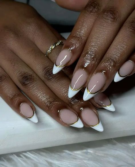 20 Best Fall Nail Colors for Dark Skin Tones 2024: Matte, Bold, and Elegant Ideas Almond French White Nails, Black Tip With Gold Line Nails, New Years Inspo Nails, Almond French Tip Nails With Gold Line, Black French Tip Nails Almond With Gold, Almond French Tip With Gold Line, Gold Line French Tip, White French Tip Nails With Gold Line, French With Line Nails