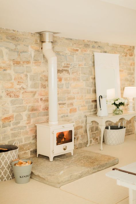 Wood Burner - Image By naomi Kenton - A Victorian Barn Conversion To A Chic And Feminine Studio Apartment. Wood Stove Hearth, Casa Country, Boho Deco, Fireplace Hearth, Design Salon, Log Burner, Barn Conversion, Wood Burner, Wood Burning Stove