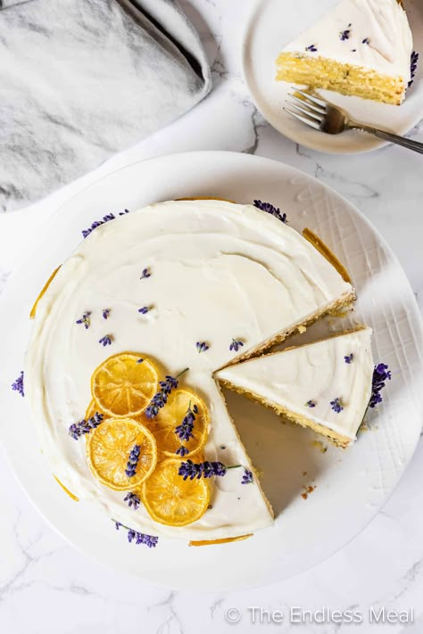 This lemon lavender cake is light and citrusy while also being delicately balanced with floral notes of lavender. Every bite is heavenly and moist and will bring the perfect finishing note to any garden party, afternoon tea, Mother's Day celebration, or baby shower. #theendlessmeal #cake #lemonlavendercake #lavendercake #lemoncake #dessert Lavender Lemon Cake, Lavender Cake Recipe, Lemon Lavender Cake, Lavender Dessert, Lemon Meringue Pie Easy, Candied Lemon Slices, Vegan Lemon Cake, Mother's Day Celebration, Lemon Layer Cakes