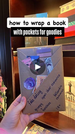 3.9K views · 516 reactions | ⚠️book wrapping tutorial⚠️

Have you seen people on social media? Wrap their books in brown wrapping paper with fun pockets? 

Well, here’s your tutorial. (Like + Save + Share to come back to)

As the holiday season approaches, don’t just give someone a book, wrap it in a really fun way. 

Message me if you have any questions! 

▪️tagged: my personal account @karafordays and my book account @booklistfordays 

#reading #booksbooksbooks #booknerd #bookaddict #readersofinstagram #bookcommunity #booksbooksbooks #romancebooks #bookblogger #bookshelf #read #romance #bookhaul #reader #bibliophile #bookstagramph #bookstagram #bookworm #booklover #bookstagram #funnymeme #bookmeme #bookmemes #romantasy #fantasy #romancefantasy | Kara Robinson ✨bookstagrammer✨ | Taylor Sw Wrapping A Book With A Pocket, Book Wrapping Tutorial, Book Wrapping Ideas Brown Paper, How To Wrap A Book With Pocket, How To Wrap A Blind Date With A Book, Wrap Book Gift, How To Wrap A Book Gift, How To Wrap Books As Gifts Presents, Wrapping A Book As A Gift