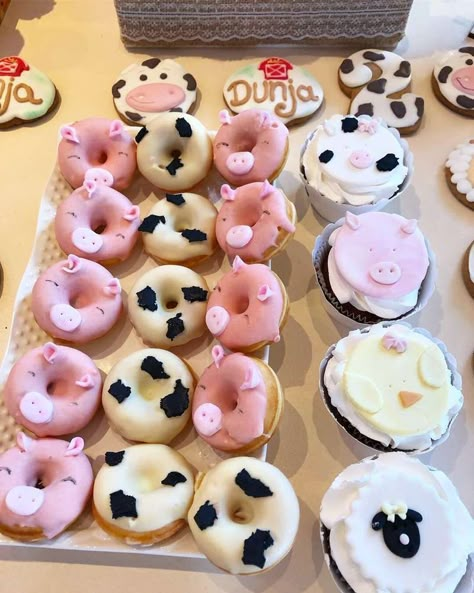 Fun Farm Birthday Party | CatchMyParty.com Farm Animal Donut Ideas, Cow Birthday Dessert, Cow Donut Ideas, Farm Party Cupcakes, 1st Birthday Farm Theme Girl, Farm Birthday Cupcakes, Farm Cupcakes Ideas, Girl 2nd Birthday Themes, Cow Birthday Party Girl