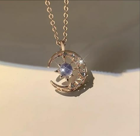 Elevate your style with our enchanting Moon & Star Pendant Necklace, a perfect blend of celestial charm and timeless elegance. This stunning necklace features a crescent moon and star design, meticulously crafted in two exquisite finishes: lustrous gold and shimmering silver. Key Features: - Design: The pendant showcases a delicate crescent moon cradling a radiant star, symbolizing dreams and guidance. The moon is adorned with intricate detailing, and the star is set with a sparkling cubic zirco Sun And Moon Necklace, Star And Moon Necklace, Pretty Jewelry Necklaces, Romantic Necklace, Collar Chain, Moon Pendant Necklace, Wedding Party Jewelry, Star Moon, Fancy Jewelry