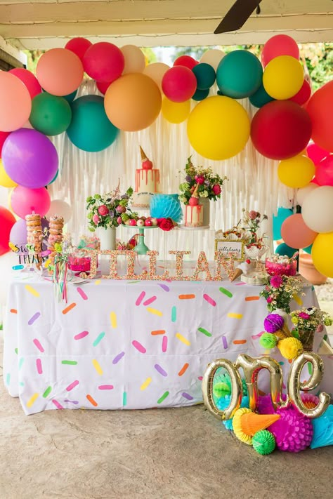 I'm swooning over the sweetness in this Sprinkles and Ice Cream Birthday Party by Juliet Boydstun of the COOP - LA, out of California! Dripping with details delicious and darling, this first birthday celebration is packed with ideas you have to get a scoop of! So lick your lips and take a bite out of these adorable elements that are beyond amazing:  Acrylic Party Signage Melting Ice Cream Cone Party Hats Sprinkle Linens Colorful Dessert Table Balloon Garland  Ice Cream Themed Partyware Sprinkle Ice Cream Cone Party, 23 Bday, Sprinkles Birthday Party, 21st Ideas, Cream Birthday Party, Colorful Birthday Party, Colorful Desserts, Sprinkle Party, Ice Cream Birthday Party