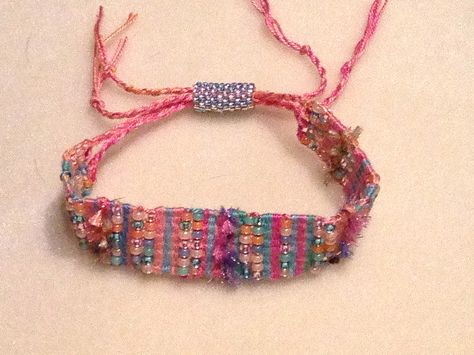 Finally finished!  I like the fuzzy yarn.  The bracelet looks "beachy" and fun to me. Fun Beads, Yarn Bracelets, Fabric Bracelets, Fiber Jewelry, Dope Jewelry, Textile Jewelry, Woven Bracelets, Bracelet Crafts, Beads And Wire