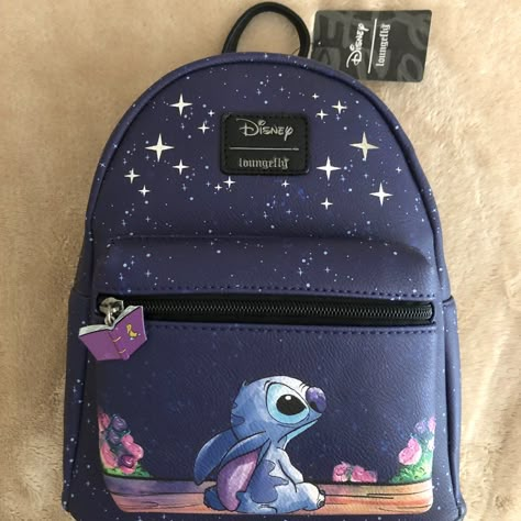 Nwt Loungefly Disney Stitch Starry Night Mini Backpack. Brand New W/ Tags Bnwt / Nwt / Bnt. I'm Open To Reasonable Offers. Non-Smoking Home. Stored & Shipped W/ Care. Rare Grail Handbag! This Limited Release Dark Blue & Black Faux Leather Mini Backpack Is No Longer Produced & Hard To Htf Find In New Condition. It Features Stitch Gazing Up At The Starry Night Sky. Cute Pull Charm On The Front Pocket Of A Purple Book W/ A Duckling. It's Perfect For Your Next Vacation On A Dcl Caribbean Cruise To D Painting Backpack, Stitch Merchandise, Stitch Things, Disney Bags Backpacks, Lilo And Stitch Merchandise, Palm Springs Mini Backpack, Lilo Und Stitch, Lv Backpack, Laughing Funny