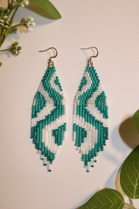 These beaded earrings are handmade with love and size 11/0 glass beads woven by hand one bead at a time. They are perfect for any occasion! I use high quality materials to ensure they bring you joy and last for a long time! Measurements: 4 inches long and 1.18 inches wide Materials: -11/0 glass seed beads -Thread -Sliver plated ear wires Green Beaded Earrings, Seed Bead Earrings Patterns, Native American Quilt Patterns, Simple Bead Earrings, Seed Bead Patterns Free, Beaded Earrings Diy, Beaded Jewlery, Seed Bead Patterns, Jewelry Design Earrings