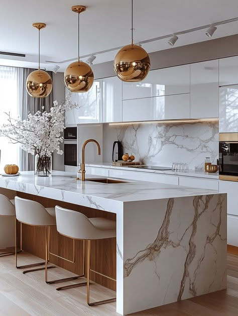 Discover the latest kitchen design trends with this elegant marble setup! The gold accents and modern fixtures create a luxurious feel, perfect for a home bedroom refresh. Transform your space today! 🏡 #KitchenDesign #HomeRefresh #InteriorStyling Modern Kitchen With Gold Accents, Upscale Small Kitchen, Modern Kitchen Gold Hardware, Kitchen Ideas Gold Accents, Champagne Kitchen Decor, Beige White Gold Kitchen, Kitchen Ideas With Gold Fixtures, Kitchen Accent Lighting Ideas, White Kitchens Gold Hardware