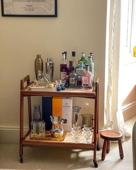 Cait 〰️ interiors + lifestyle | New (old) bar cart alert 🍸 picked this beauty up for the grand sum of five English pounds at a car boot sale at the weekend, and couldn’t… | Instagram Bar Cart Mid Century, Bar Cart Home Decor, Alcohol Tray Bar Carts, Small Space Bar Cart, Bar Cart Items, Cocktail Bar Ideas Home, Scandinavian Bar Cart, Bar Cart Table, Wood Bar Cart Styling