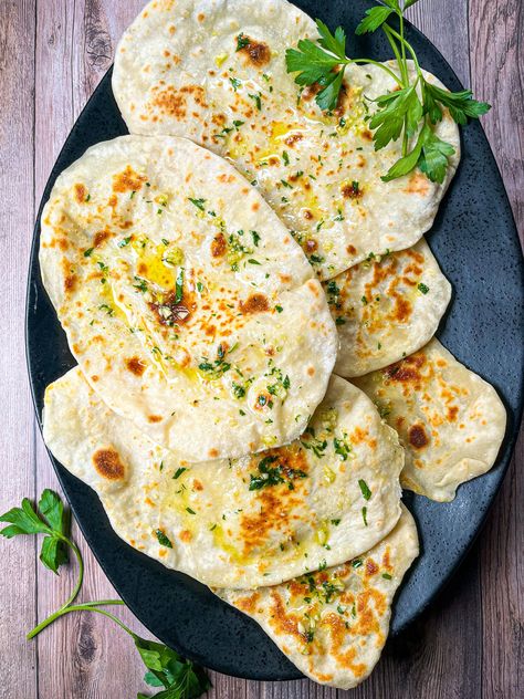 This garlic naan bread recipe is SO easy, requiring only 30 minutes to prep the dough and a handful of healthy ingredients (like non-fat Greek yogurt). Easy Garlic Naan, Garlic Naan Bread Recipe, Garlic Naan Bread, Naan Recipes, Garlic Naan Recipe, Naan Bread Recipe, Bread Toppings, Recipes With Naan Bread, Facts About Yourself