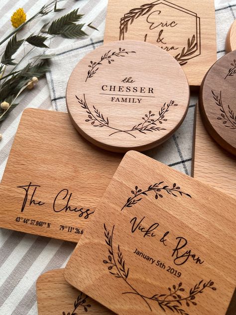 A set of premium quality wood coasters, engraved to keep special memories always within reach.  Protect surfaces and make any drink meaningful with our personalized coasters. Made from natural wood, and engraved by us with a custom design created to your liking. They make the perfect gift for any occasion--commemorating a wedding, an anniversary, or a new home-- that your loved ones can enjoy every day.  Each piece is crafted with the utmost care: engraved by a precise CO2 laser machine, and pol Pyrography Wedding Gift, Wedding Gift Coasters, Wood Burned Wedding Gift, Laser Engraving Design, Engraved Wood Ideas, Laser Machine Ideas, Wood Etching Ideas, Small Laser Engraving Ideas, Laser Engraved Wedding Gifts