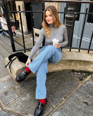 8 Chic Ways That French Women Wear Socks With Ballet Flats and Loafers | Who What Wear Loafers With Colored Socks, Flats Winter Outfit, Loafer Winter Outfits Women, Oxblood Loafers Outfit, Loafers With Bootcut Jeans, Loafers Outfit For Women, Socks And Loafers Women, Brown Loafers Outfit Women Casual, Socks With Loafers Women