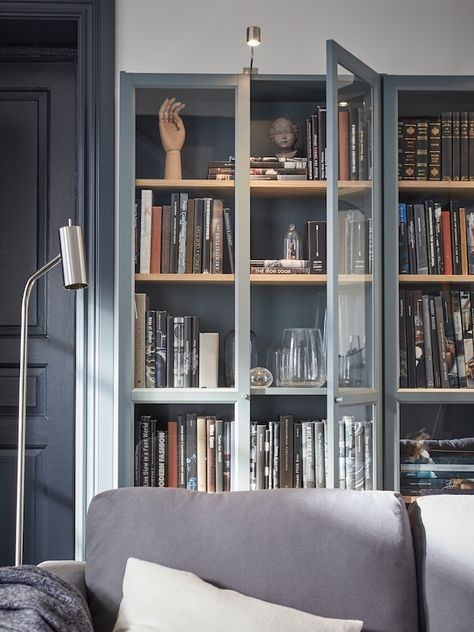 Billy Ikea, Bookcase With Glass Doors, Led Cabinet Lighting, Ikea Billy, Ikea Ideas, Billy Bookcase, Home Library Design, Cosy Living Room, Studio Living