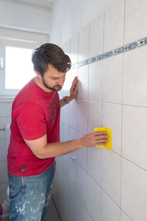 Step by step DIY guide on how to paint tiles in your kitchen or bathroom. This beginner-friendly project will help you transform your space on a budget and includes our top 5 tips to help you achieve a long-lasting finish! Painted Bathroom Tile Walls, Stick On Tiles Bathroom, How To Paint Tiles, Bathroom Tile Paint, Painting Over Tiles, Ceiling Tiles Bathroom, Painting Bathroom Walls, Bathtub Shower Remodel, Painted Shower Tile