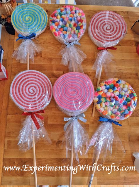 How To Make Candy Props Giant Lollipops, How To Make Giant Fake Lollipops, Giant Lollipop Prop, Christmas Decorations Candy Theme, Diy Lollypop Decor, Giant Lolly Decorations, Jumbo Lollipop Diy, Candy Land Paper Crafts, Lolipop Ideas Craft