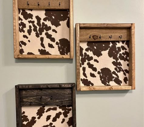 Cowhide Jewelry Holder, Country Western Craft Ideas, Wood Western Decor, Cowhide Projects Ideas, Western Hanging Decor, Western Dollar Tree Diy, Cow Print Wall Decor, Cowhide Furniture Ideas, Western Craft Fair Display