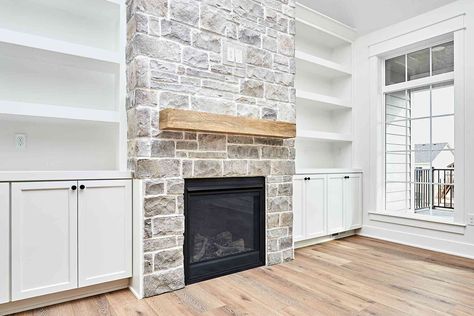 How to Whitewash a Stone Fireplace for an Easy DIY Makeover Fireplace Tv Living Room, Painted Fireplace Stone, Whitewashed Fireplace, Bungalow Fireplace, Whitewash Stone Fireplace, Whitewash Fireplace, White Wash Fireplace, Painted Stone Fireplace, White Stone Fireplaces