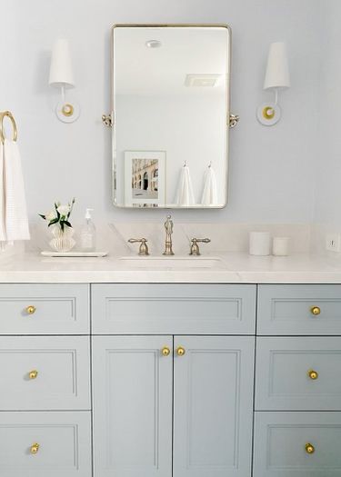 We feel like we’re in the clouds with the results of this bathroom vanity, especially with the soft baby blue cabinet finish 🌥️ With the help of the design team at @lavishdesignstudiola the team was able to bring this dreamy vibe to life - Cabinetry Team: @VSI_INC Design Team: @lavishdesignstudiola - #bathroomdesign #bathroomrenovation #bathroominspiration #cabinetinsporation #cabibetmaker #customcabinets #customhomes #customdesign #bluecabinets #dreamybathroom #southbayhome #southbay Boothbay Gray Bathroom Vanity, Pale Blue Bathroom Cabinets, Powder Blue Bathroom Vanity, Bathroom With Light Blue Vanity, Light Blue Cabinets Bathroom, Light Blue Bathroom Cabinets, Baby Blue Cabinets, Blue Cabinets Bathroom, Light Blue Bathroom Vanity