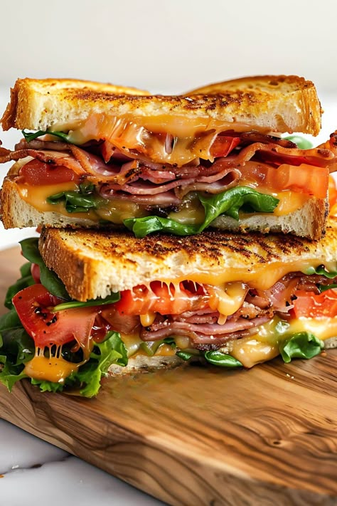 This BLT grilled cheese sandwich features crispy bacon, gooey melted cheese, juicy tomatoes, and fresh lettuce, all nestled between buttery grilled sourdough. Hot Weather Food, Hand Tattoos For Women Unique, Ethereal Tattoos, Tattoos For Women Unique, Burrito Recipes, Spicy Grilled Chicken, New Food Ideas, Popular Dinner Recipes, American Foods