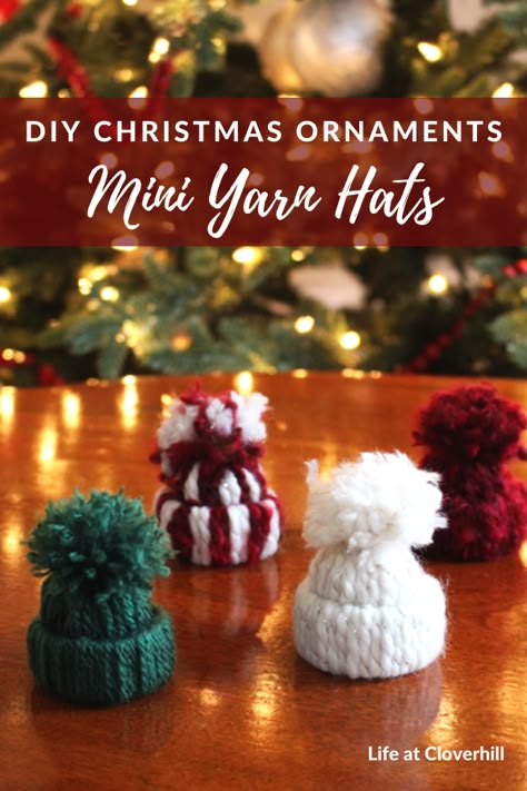 Mini Yarn Hat Christmas Ornaments - Life at Cloverhill Mini Winter Hat Tree Ornament, Tiny Knit Hat Ornament, How To Make Mini Yarn Hats, Snowman Hat Ornaments Diy, Mini Yarn Hat Gnomes, Mini Beanie Hats, Crochet Mini Hat Ornament, Yarn Winter Hat Ornaments, Gnome Hat Ornament