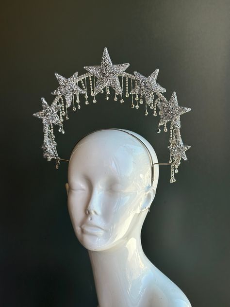 Dazzle and Sparkle bright in this Star studded jewel halo festival crown. We can customize design to match your outfit, get in touch for a design consultation and custom quote.  S H I P P I N G -  Processed same day or within 24 hours.  1-2 day guaranteed delivery, add item to cart, click shipping tab for rates.  Pls leave a check out note with your need date & contact number  Msg for delivery time frames (Include your state/country) S I Z E  Adult size. For children, pls contact to resizing or Star Head Piece, Star Princess Aesthetic, Star Goddess Costume, Moon Crown Goddesses, Mirror Headpiece, Moon Costume Ideas, Jeweled Outfit, Space Headpiece, Star Costume Women