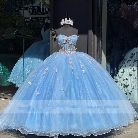 Sea Blue Quinceanera Dresses, Blue Pageant Gown, Light Blue And Gold Quinceanera Dress, Winter Wonderland Quinceanera Theme Dress, Baby Blue 15 Dresses Quinceanera, Quensenara Ideas, Quinceanera Themes Ideas, Butterfly Quinceanera Dress, Baby Blue Quinceanera Dresses