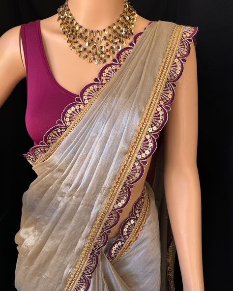 Silver mettalic tissue saree with contrast magenta golden lace all over sarees. Comes with beautiful big magenta thread tassels on pallu. Blouse: running blouse 80cm. To find this product in website: Www.thejacouture > Tissue sarees> silver mettalic tissue saree. Jewellery collaboration: @anvi__jewellery #mettalictissuesaree #silversaree #fancysaree #tissuesaree #trendingsaree #tissuelacesaree Silver Saree With Contrast Blouse, Net Saree Designs, Saree Combination, Saree Inspiration, Tissue Sarees, Thread Tassels, Golden Saree, Saree Jewellery, Lace Saree