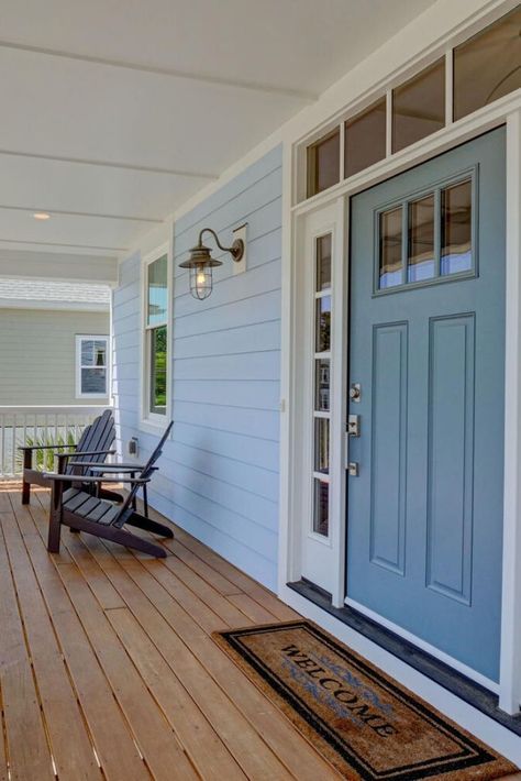 Loving this sea blue colored front door against the light blue siding. #exterior #frontdoor #colorideas #welcome Light Blue House Exterior, Blue Siding House, Blue Exterior House Colors, House Doors Colors, Light Blue Houses, Blue Siding, Blue Front Door, Christmas House Lights, Blue Roof