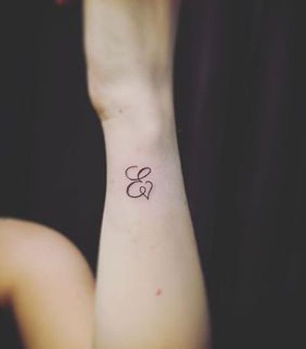 Expressive E Letter Tattoo E Letter Tattoo, Tattoo Ghost, Meaningful Wrist Tattoos, E Letter, Fonts For Tattoos, Letter Tattoo, Initial Tattoo, Pretty Tattoos For Women, Monogram Tattoo