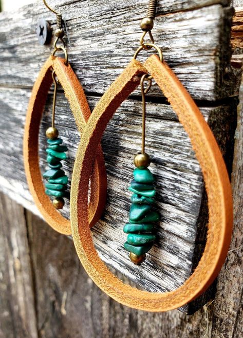 A beautiful drop of natural Malachite dangles inside these large, handmade Latigo leather earrings. Malachite stones are matched by hand to compliment each other in size, shape, and color, making this a striking and unique pair. (These stones are genuine Malachite, not dyed magnesite or howlite.) Personalize your earrings with the following leather color options (as shown in photo): black, mahogany, tan (representative photos), beige, white, or silver. Ear wires and findings are nickel-free and Resin Leather Jewelry, Leather Earring Shapes, Small Leather Earrings, Leather Earring Designs, How To Make Leather Earrings, Leather And Bead Earrings, Diy Boho Earrings, Unique Diy Earrings Ideas, Boho Earrings Diy