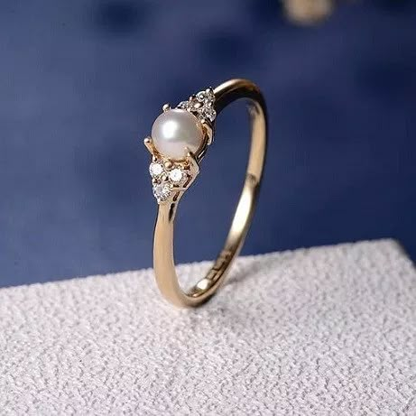 Pearl engagement rings