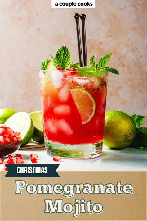 This Christmas Pomegranate Mojito is a festive twist on the classic mojito, made with pomegranate juice and fresh mint. Perfect for parties and special occasions like Thanksgiving or Christmas. This pitcher drink is as beautiful as it is delicious. Pop over to our site for this rum cocktail recipe! Pomegranate Mojito Recipe, Christmas Mojito, Christmas Pomegranate, Pomegranate Mojito, Liqueur Cocktails, Rum Swizzle, Spiced Cocktail, Classic Mojito, Best Fish Recipes