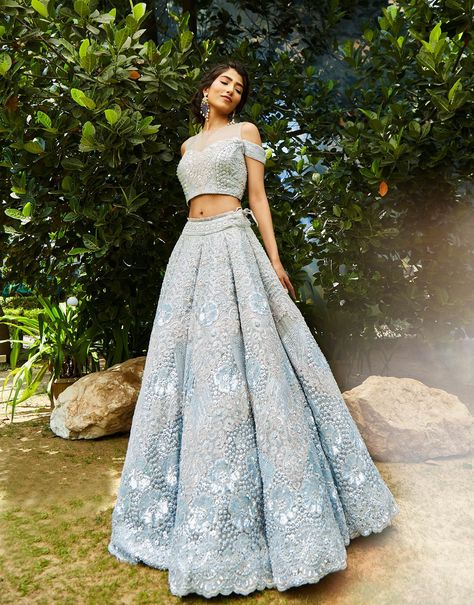 A pastel lehenga is a perfect attire for a day wedding. Moreover, it is quite pairable with some light jewellery designs that will not make you look overly dressed. #pastelbridallehenga #pastellehenga #pastellehengawedding #pastellehengabridesmaid #indianweddingoutfits #bridallehengas #bridaloutfits #indianweddingwears  #trendy #unique #weddinginspiration #bridallehenga #lehengas #weddingideas #india #indianlehengasideas #bridalmakeup #bridalhairstyle #pastellehengabridal #pinkpastellehenga Pastel Lehenga Bridesmaid, Pastel Lehenga Wedding, Powder Blue Lehenga, Trending Lehenga Designs, Bridal Lehenga Indian, Lehenga Inspiration, Pastel Lehenga, Lehenga Bridesmaid, Bridesmaid Lehenga