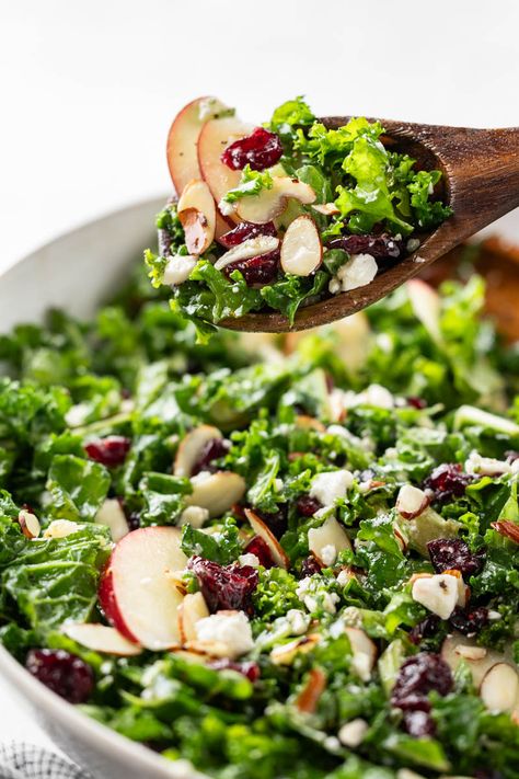 Kale salad is the perfect harmony of sweet and tangy, with fresh apples and craisins meeting a zesty lemon and olive oil dressing. Quick to toss together, this salad is as enjoyable to make as it is to eat. Hazelnut Salad Recipes, Dinners For Pregnant Women, Dinner Recipes For Pregnant Women, Charcuterie Salad, Healthy Clean Dinner, Recipes For Pregnant Women, Tangerine Salad, Kale Salad Dressing, Kale Apple Salad