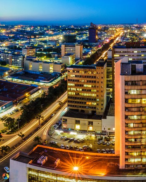 Lusaka, Zambia   Lusaka has become something of a boom town of late. New buildings are going up everywhere and many chain stores and shopping malls are springing up all over the sprawling suburbs. Lusaka Zambia, Safest Places To Travel, Zambia Africa, Africa Do Sul, Night Pictures, Medical Tourism, American Travel, African Countries, Night City